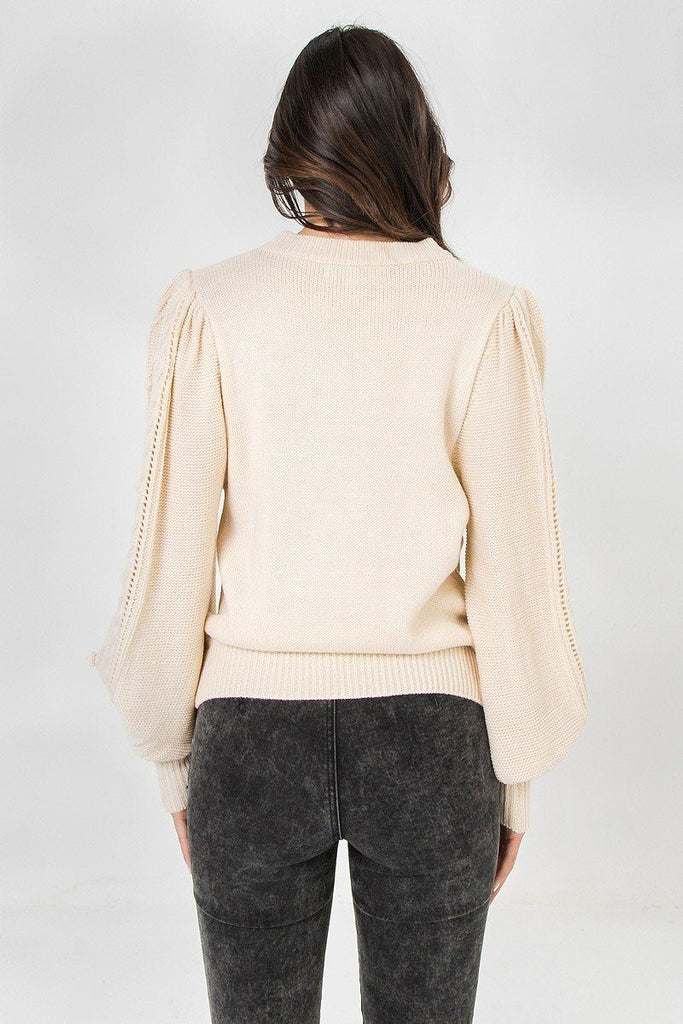 A Sweater Featuring Round Neckline